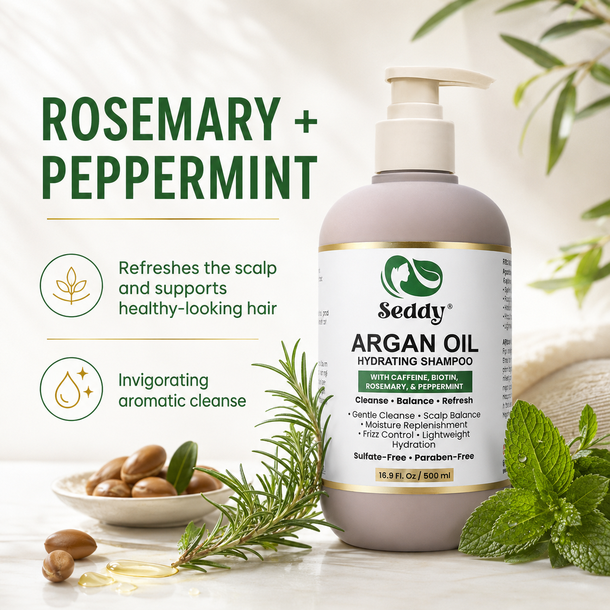 A bottle of Seddy Argan Oil Hydrating Shampoo with a pump dispenser, styled with rosemary, peppermint leaves, and olives on a light marble surface. The left side features text highlighting 'ROSEMARY + PEPPERMINT' and product benefits.