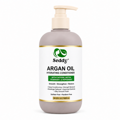 A 16.9 fl oz pump bottle of Seddy Argan Oil Hydrating Conditioner, featuring a taupe-gray bottle, a cream-colored pump dispenser, and a white label with green and gold accents.