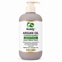 A 16.9 fl oz pump bottle of Seddy Argan Oil Hydrating Shampoo, featuring a white label with green and black text, a gray-brown bottle body, and gold accents, set against a plain white background.