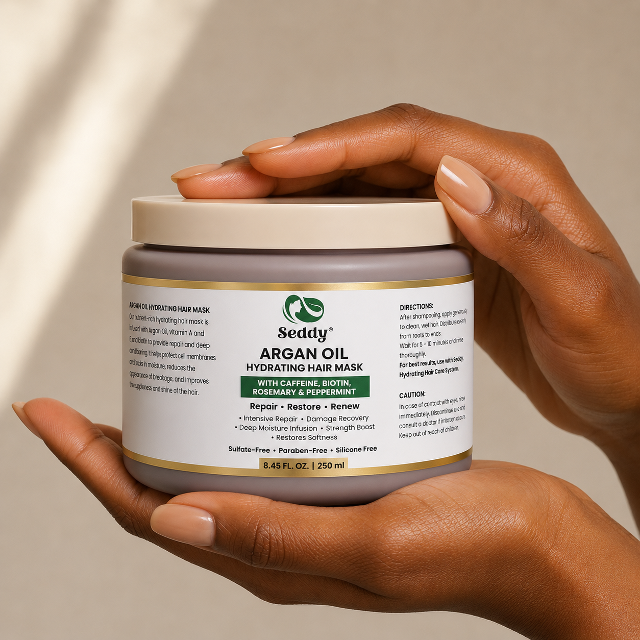 a woman holding the hair mask bottle